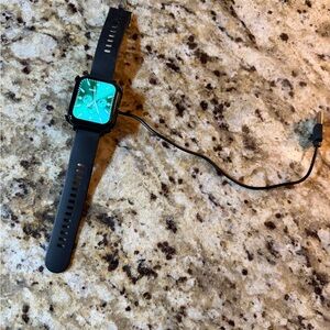 Black Smartwatch with Charging Cable
